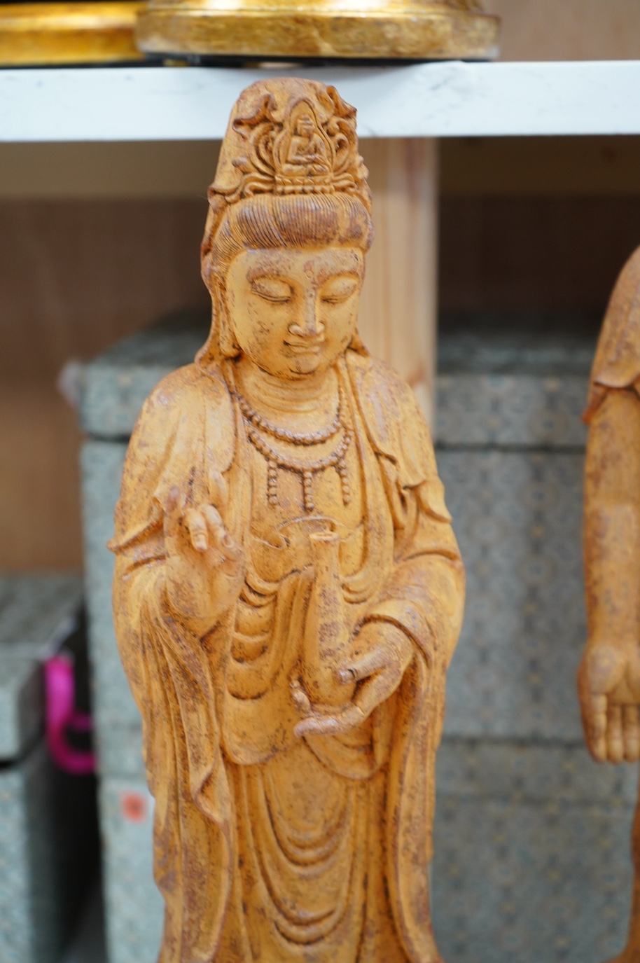 A set of three large Chinese patinated heavy glass figures of Bodhisattvas, tallest 49cm. Condition - good